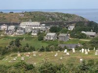 The view overlooking The Island Inn, on Monhegan, is lovely (main photo); seals (below, at The Goslings) are a common sight; and a dinghy dock in Belfast (bottom; Ilene with white hull and dark sail cover).