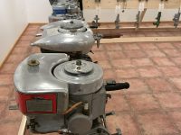 Photo by David RoperWho goes to antique outboard motor exhibits? Lots of men over 50, in part because of the memories these machines evoke.