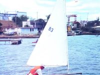 Photo courtesy Greg CoppaThe late Gordon Crossman aboard his home-built sailboat, into which he incorporated many found items.