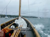 Photo by Michael LongApproaching the boat launch at hull speed, under mizzen alone, with mainsail and jib in a heap forward.
