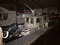 Salty Paws -- Molly and Bill's Rosborough 246 Pocket Trawler -- gets a well-deserved rest after a long day of travel. Photo by Dick Klain