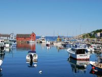 The shack that launched 1,000 images: Rockport's iconic Motif #1 fish house, and (inset) the view of the harbor there from inside "the claws." Photo by Marilyn Pond Brigham