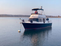 Photo courtesy Joanne MilkeThe author and her husband aboard Kindred Spirit, their home away from home.