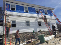 Photo courtesy Jack FarrellJohnny Kadlik's crew replacing windows, siding and trim on the crew quarters known as "The Shack." The work out at the Isles is relentless.