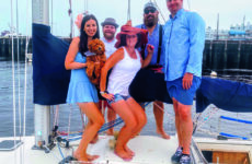 Photo courtesy Ali WischThe winning "Wannabe Pirates" aboard Seabiscuit post-race. L-R - Brittany (holding the team mascot, Rowan), Isaac, Ali, Mike, and Jason.