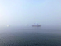 Photo courtesy Richard SchultzThe author’s Catalina 42 Little Wing on her home mooring in Pepperell Cove. The fog would persist throughout the journey.
