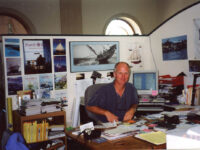 Photo courtesy Sandy MarstersSandy, at his desk in the Points East Portland headquarters.