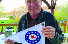 Photo courtesy Capt. Michael L. MartelThe author, 48 years older, with the burgee of the Corinthian Yacht Club of Cape May, N.J.