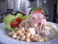 Wikipedia/Picanteria Karol Ceviche scallops “cook” in an acidic marinade of citrus and/or vinegar.