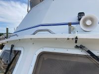 Photo by David SharpThe windshield washing system features nozzles installed over the windshields that deliver fresh water from a tank and pump mounted in the console of the flying bridge above the cabin.