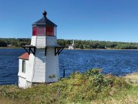 Squirrel Point Light, Kennebec River, with Phippsburg in the background. Photo by Tim plouff