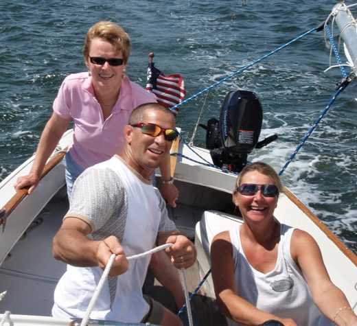 Rob, Tracy and Helen (on the tiller), students in the first-ever Basic Keelboat class offered by the Cape Cod Sailing School, put Blue Skies through her paces.Photo by Mark Barrett
