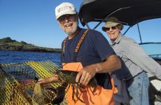 Photo courtesy Randy RandallThe author, foreground, holds a keeper while his fishing partner Gary looks on.