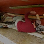 Foster and Foy jambing the plank in place.