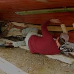 Foster and Foy jambing the plank in place.