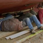 A second fastener goes in.