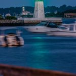 Goat Island (green in foreground) and Rose Island (white in background), Newport, R.I. It’s pretty rare to have two lighthouses in one shot, capturing both lights illuminated at the same time, at midnight and from private property. The nontraditional green light on Goat Island was added in 2005.